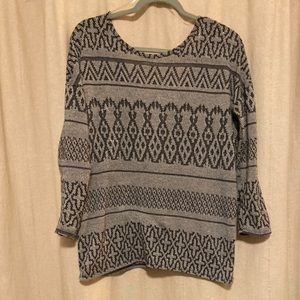 Francesca’s black and white patterned sweater